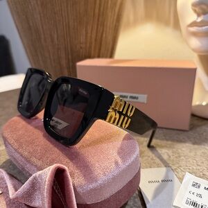 Miu Miu Black and Gold Sunglasses MU B05S